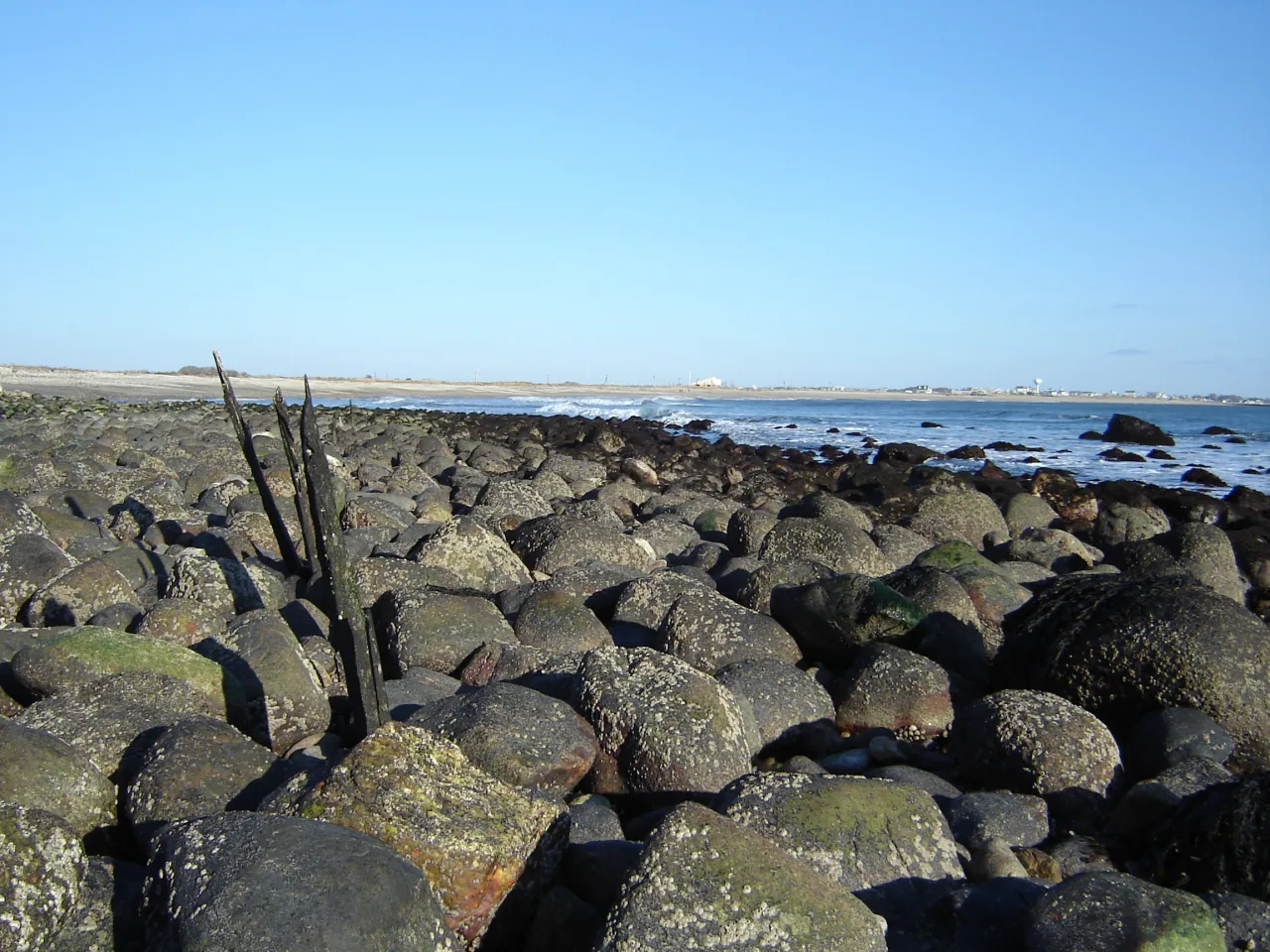A view toward East Matunuck Beach from its rocky western shoreline.